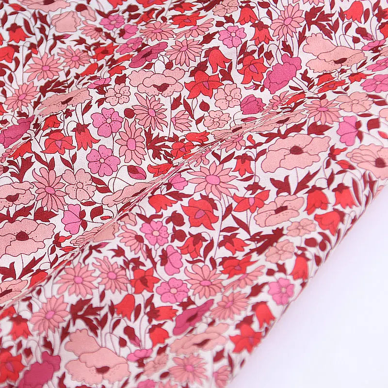 Poppy and daisy printed pink color florals fabric rose background London liberty tana lawn 100% cotton 80S fabrics for sewing